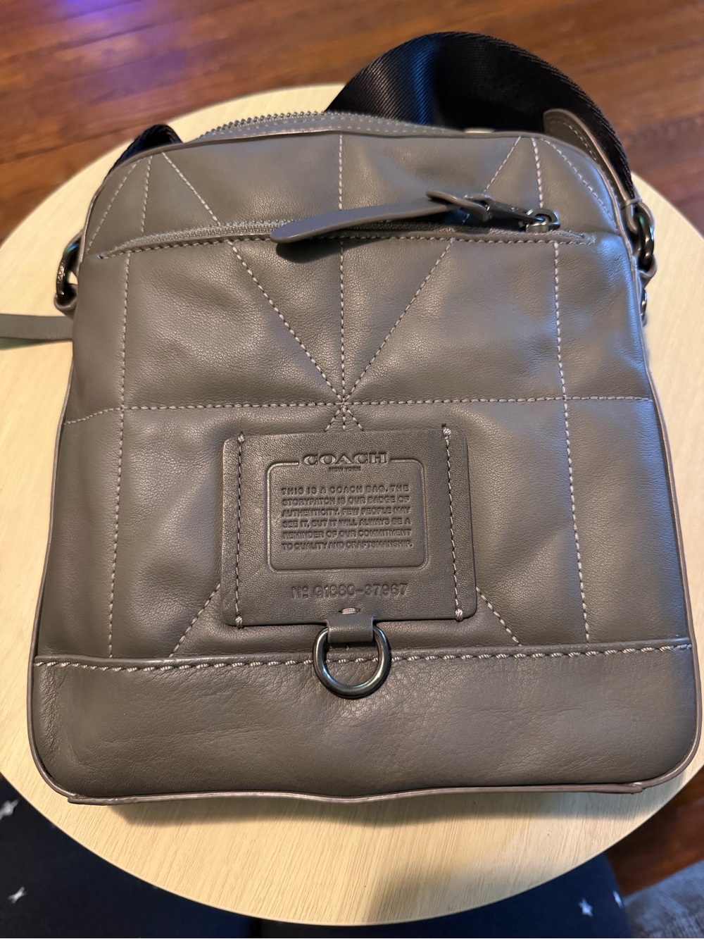 Coach Gray Leather Crossbody Bag with matching wallet.